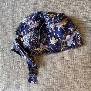 Blue Sky Navy Cap with Leopard and Leaf Design